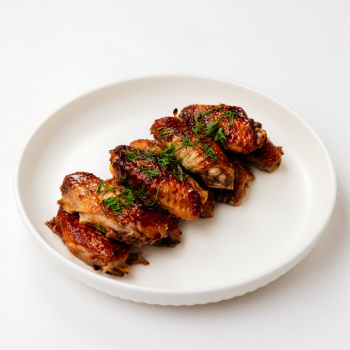 Крылышки в медово-соевом маринаде жареные, 100г